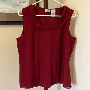 Burgundy colored shell. Perfect condition.